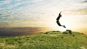 nature_grass_people_jump_sky_1366x768_37510
